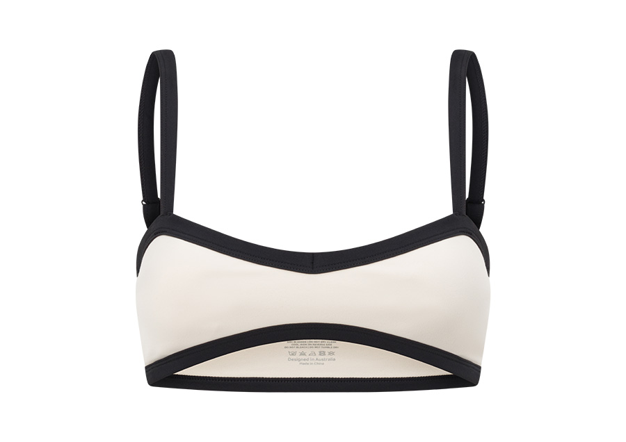 Professional photo of a sportswear top from All For Mimi styled as 3D invisible ghost mannequin